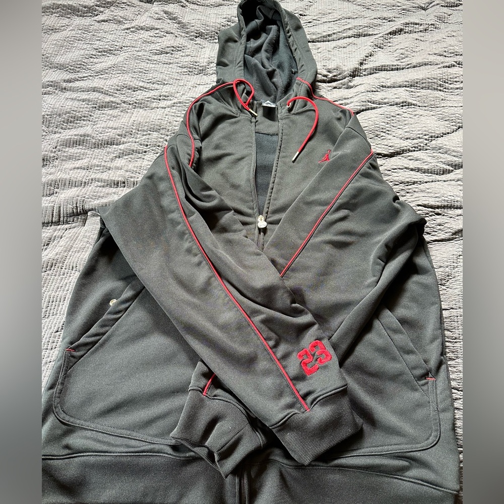 Black and red Jordan zip up hoodie.